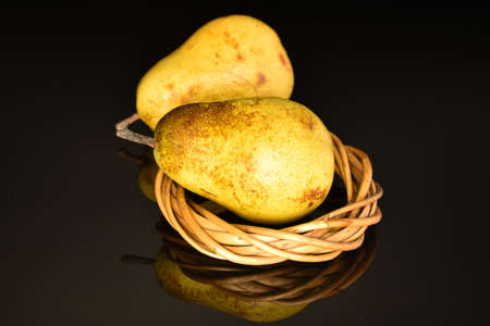 Ripe juicy, organic pears, close-up, on a black background.の写真素材
