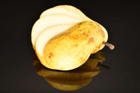 Ripe juicy, organic pears, close-up, on a black background.の写真素材