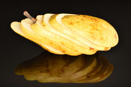 Ripe juicy, organic pears, close-up, on a black background.の写真素材