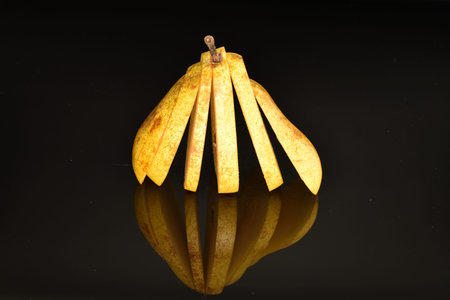Ripe juicy, organic pears, close-up, on a black background.