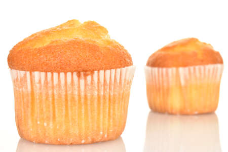 Fresh tasty muffins, close-up, on a white background.の写真素材