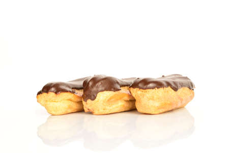 Sweet, mouth-watering chocolate eclairs, close-up, on a white background.の写真素材