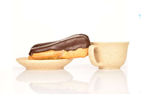 Sweet, mouth-watering chocolate eclairs, close-up, on a white background.の写真素材