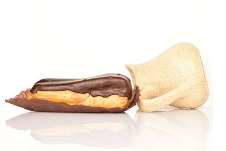 Sweet, mouth-watering chocolate eclairs, close-up, on a white background.の写真素材