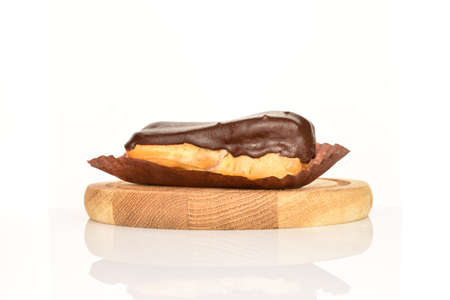 Sweet, mouth-watering chocolate eclairs, close-up, on a white background.の写真素材