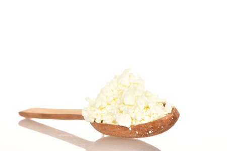 Fresh tasty, nutritious cottage cheese, close-up, on a white background.の写真素材