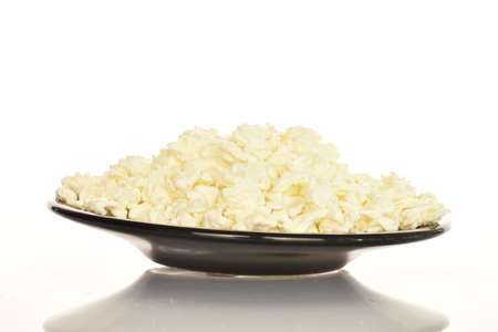 Fresh tasty, nutritious cottage cheese, close-up, on a white background.の写真素材