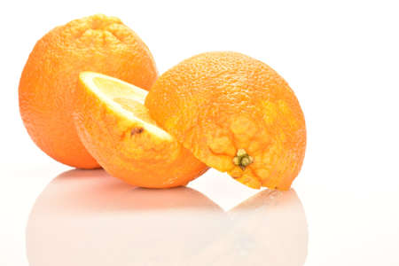 Ripe, organic orange, macro, on a white background.の写真素材