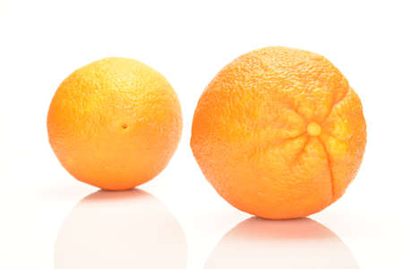 Ripe, organic orange, macro, on a white background.の写真素材