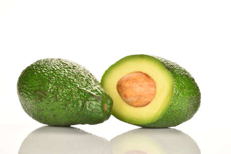 Juicy, ripe, organic avocados, close-up, on a white background.の写真素材