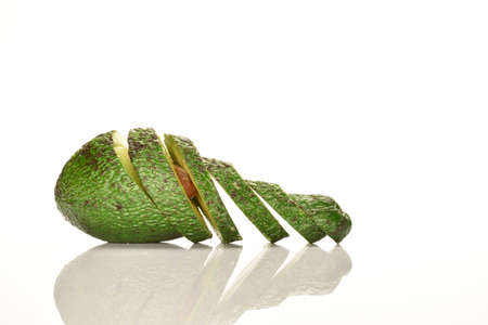 Juicy, ripe, organic avocados, close-up, on a white background.の写真素材