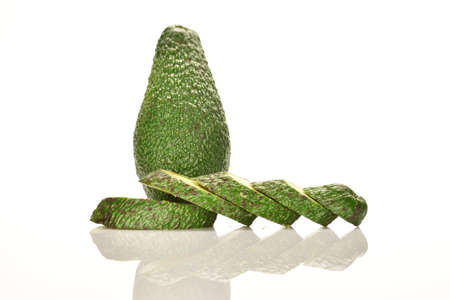 Juicy, ripe, organic avocados, close-up, on a white background.の写真素材