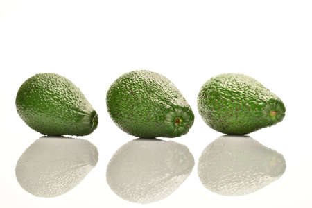 Juicy, ripe, organic avocados, close-up, on a white background.の写真素材