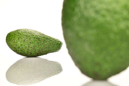 Juicy, ripe, organic avocados, close-up, on a white background.の写真素材