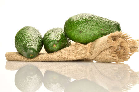 Juicy, ripe, organic avocados, close-up, on a white background.の写真素材