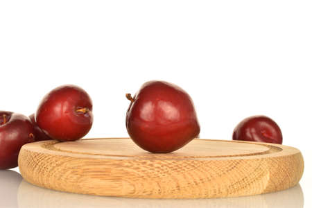 Juicy, tasty, organic red plum, close-up, on a white background.の写真素材