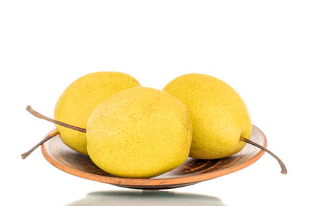 Organic bright yellow pears, close up.の写真素材