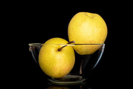 Organic bright yellow pears, close up.の写真素材