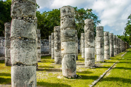 The columns in the thousand warriors temple complex inside the maya archeological site of Chichen Itza, Mexicoの写真素材
