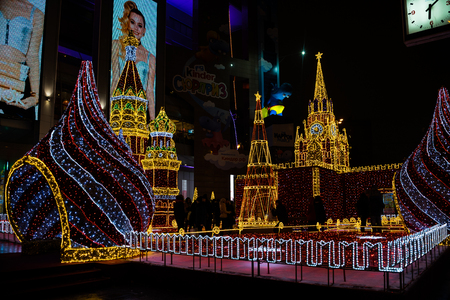 MOSCOW, RUSSIA - DECEMBER 9, 2017: New Year 2018 and Christmas decoration in the Moscow streets. St. Basils cathedral and Kremlin made of garlands.のeditorial素材
