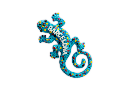 The souvenir magnet from Barcelona, Spain - colorful lizard. Isolated on white backgroundの写真素材