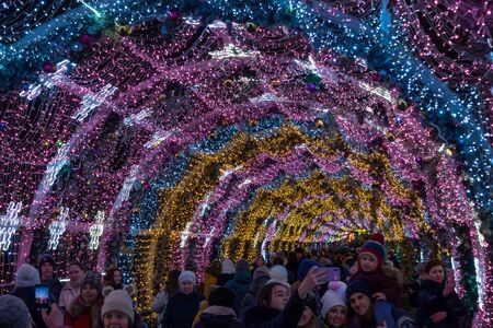 MOSCOW, RUSSIA - JANUARY 8, 2020: Colorful light tunnel on Tverskoy Boulevard. Christmas and New Year holiday decorations.のeditorial素材