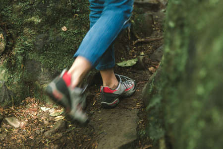 Woman comfortable boots shoes for tracking backpackingの写真素材