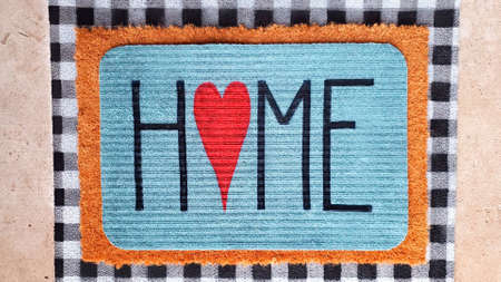 Mat with the inscription house. Doormat in vintage style with inscription. Instead of the letter ,, o ,, heart.の写真素材