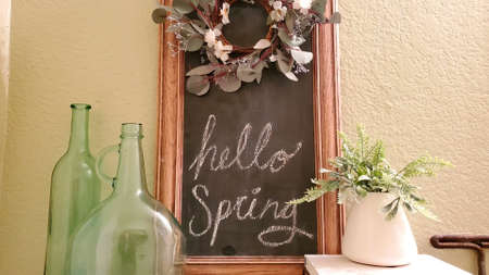 The chalk board is decorated decorative. The inscription on the blackboard, hello spring.の写真素材