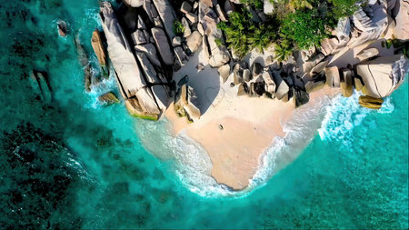 Beach top view. Beautiful beach with azure water. A heart is drawn on the beach.