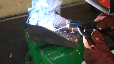Welding an object, spark welding process