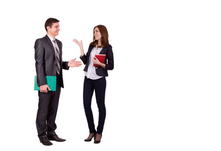 Emotional conversation Young male and female, officially dressed, discussing and hand gesturing. Full body portrait on white backgroundの写真素材