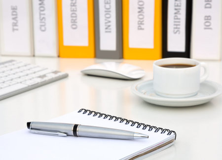 White Office Table with Notepad Executive Class Grey Metal Pen Coffee Computer Keyboard and many...