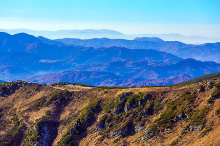 Winter Mountain View with many layers prospective and foggy remote ridgesの写真素材