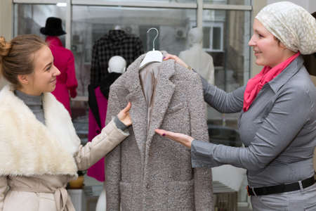 Shopping at Department Store Customer and Saleslady interactingの写真素材