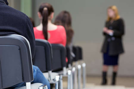 Row of Seats in Conference Room and Body of Lecturerの写真素材