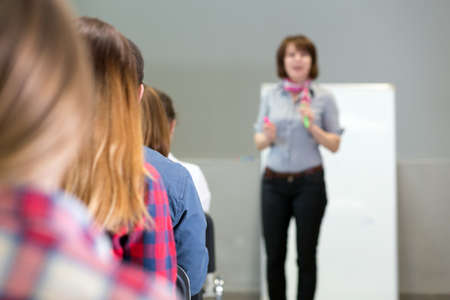 Group of Students Listening Lecturerの写真素材