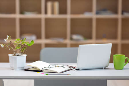 Cozy working Place on Wood Wall backgroundの写真素材
