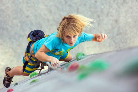 Child on climbing Wall moving upのeditorial素材