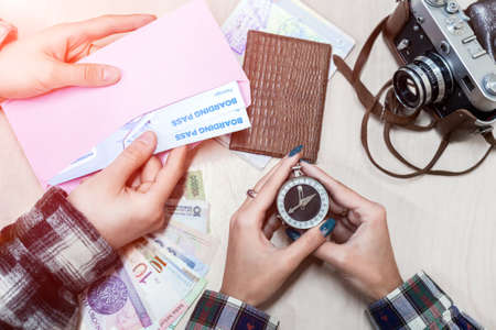 Vintage Style Travel planning Composition with two Peopleの写真素材