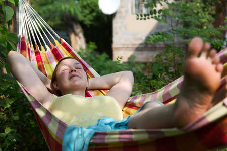 Person relaxing in Hummock at Summer Gardenの写真素材