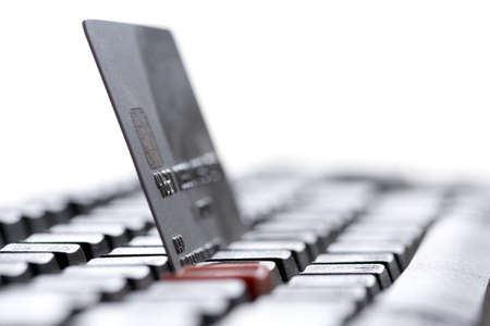 Grey Credit Card and black Keyboardの写真素材