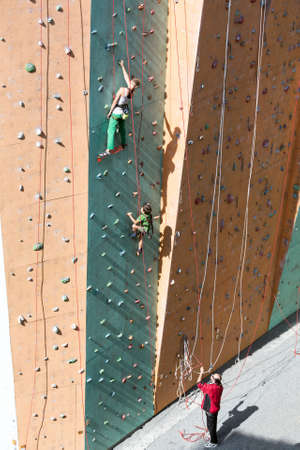 Mother and Son doing rock climbing togetherの写真素材