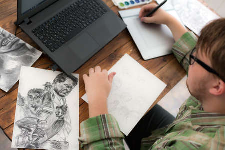 Artist drawing Sketch on Graphic Tablet Top Viewの写真素材