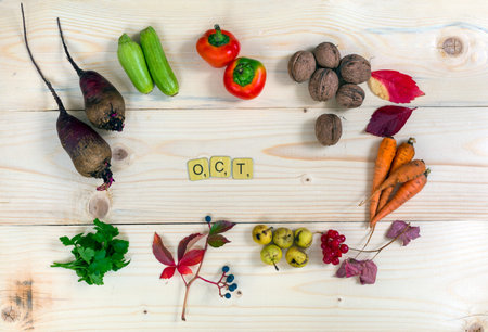Autumnal Harvest on wooden Background