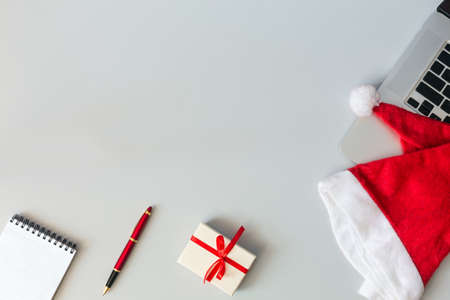 Christmas and Business Items on grey Desk with Copy Spaceの写真素材