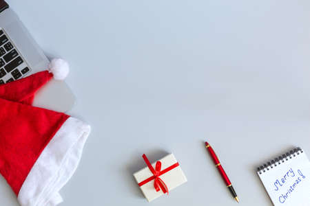 Christmas and Business Items on grey Table with Copy Spaceの写真素材