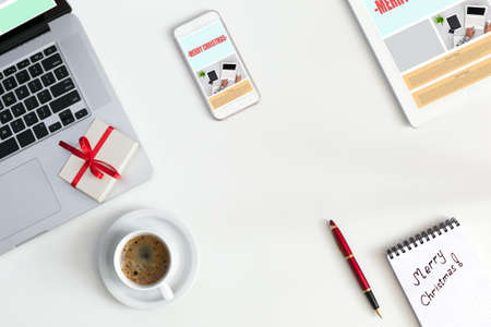 Christmas Gift among electronic Gadgets with responsive web design elemeの写真素材