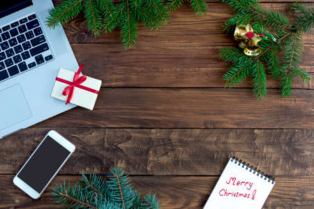 Wooden Table top View with handwritten Christmas wishesの写真素材