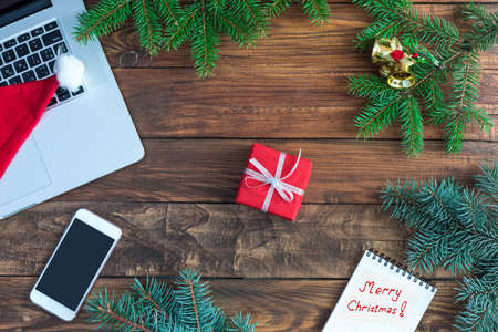 Wooden Table top View with handwritten Christmas wishesの写真素材